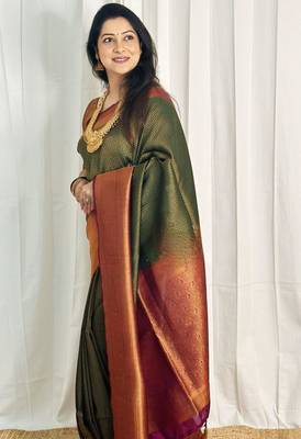 embellished dark green self design silk cotton saree with unstitched blouse 3