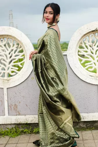  green self design art silk blend light weight saree with unstitched blouse