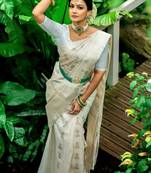 bollywood cream  self design silk cotton fancy saree with unstitched blouse