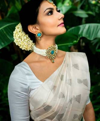  cream self design silk cotton fancy saree with unstitched blouse 2