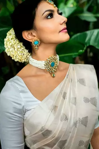 cream self design silk cotton fancy saree with unstitched blouse