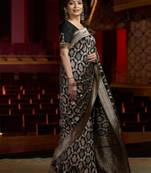 trendy black banarasi art silk jacquard saree with unstitched blouse
