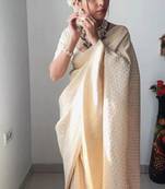 celebrity inspired cream woven pure art silk blend multicolor saree with unstitched blouse