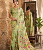 Light green elegant linen cotton saree – lightweight & comfortable ethnic wear