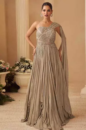 Beige chinon silk one shoulder sequins flared gown semi stitched up to 42" size