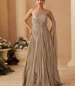 Beige chinon silk one shoulder sequins flared gown semi stitched up to 42" size