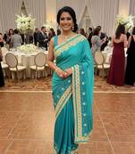 art silk party wear saree in rama with embroidery work & crystal stone work