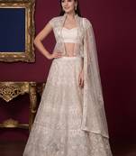 Rich Off-White Foil Work Net Reception Wear Lehenga Choli With Jacket