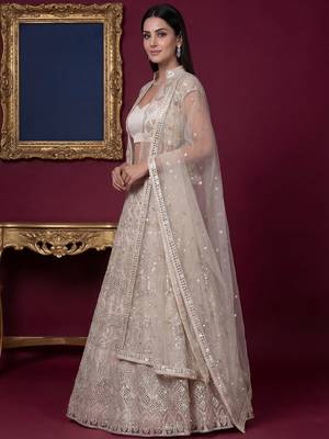 Rich Off-White Foil Work Net Reception Wear Lehenga Choli With Jacket 3