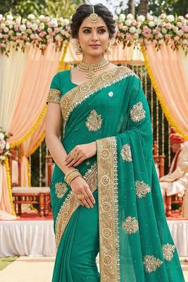 georgette wedding wear saree in green with embroidery & crystals stone work 2