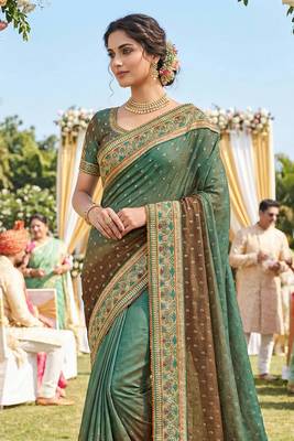 sateen silk wedding wear saree in green with embroidery work & crystal stone work 2