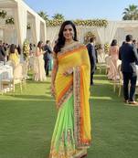 net party wear saree in yellow with embroidery work & crystal stone work