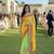 net party wear saree in yellow with embroidery work & crystal stone work