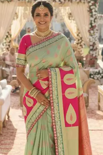 banarasi art silk party wear saree in green with embroidery work 