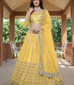 Alluring Yellow Foil Work Net Haldi Wear Lehenga Choli With Dupatta