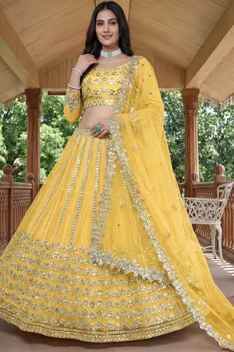 Alluring Yellow Foil Work Net Haldi Wear Lehenga Choli With Dupatta