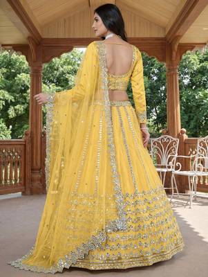 Alluring Yellow Foil Work Net Haldi Wear Lehenga Choli With Dupatta 4