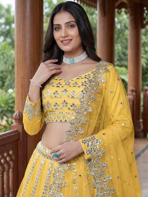 Alluring Yellow Foil Work Net Haldi Wear Lehenga Choli With Dupatta 5