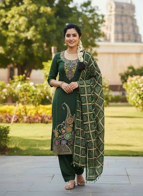 Green color beautiful stylish fancy suit for girlie looks 1
