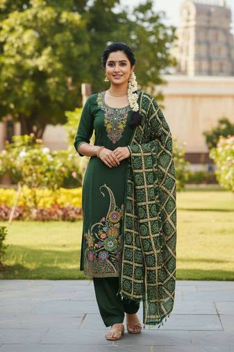 Green color beautiful stylish fancy suit for girlie looks