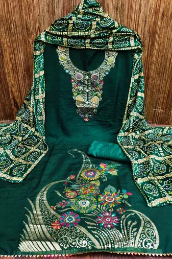 Green color beautiful stylish fancy suit for girlie looks