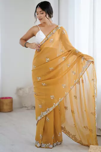 Mustard color chiffon crush fabric heavy designer work partywear saree