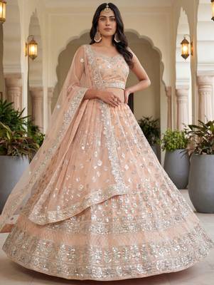 Glamorous Peach Zari Work Net Engagement Wear Lehenga Choli 2
