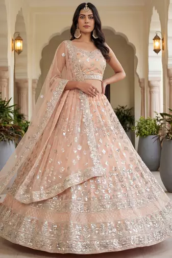 Glamorous Peach Zari Work Net Engagement Wear Lehenga Choli