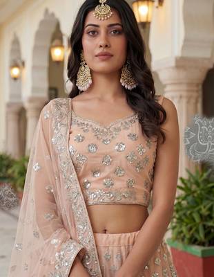 Glamorous Peach Zari Work Net Engagement Wear Lehenga Choli 5