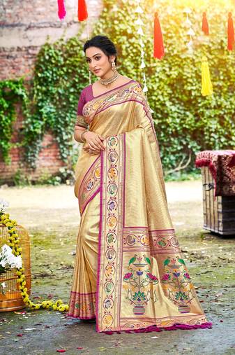 Beige color silk blended woven designer ethnic partywear saree