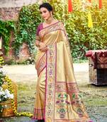 Beige color silk blended woven designer ethnic partywear saree