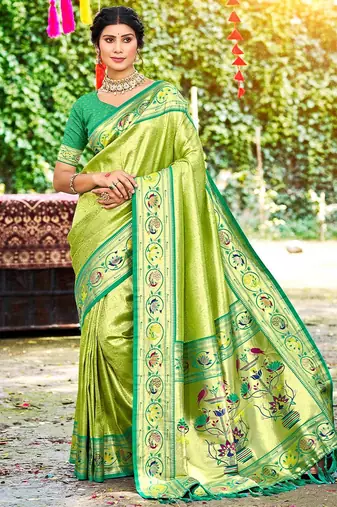 Green color silk blended woven designer ethnic partywear saree