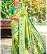 Green color silk blended woven designer ethnic partywear saree