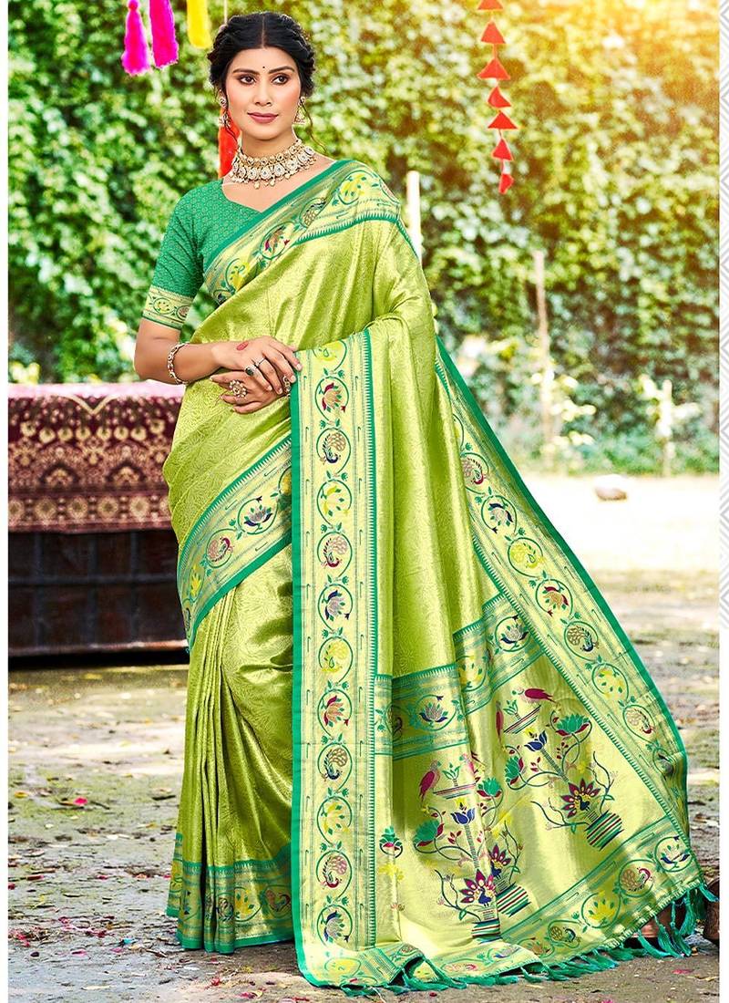 Green color silk blended woven designer ethnic partywear saree