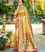 Yellow color silk blended woven designer ethnic partywear saree