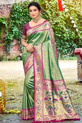 Dark green color silk blended woven designer ethnic partywear saree