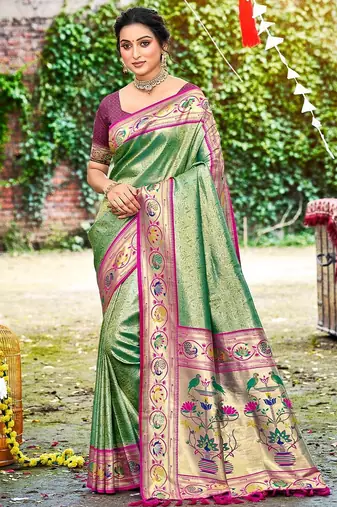 Dark green color silk blended woven designer ethnic partywear saree
