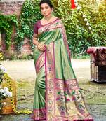 Dark green color silk blended woven designer ethnic partywear saree