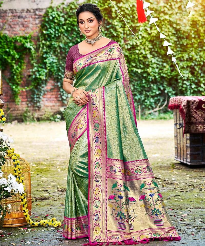 Dark green color silk blended woven designer ethnic partywear saree