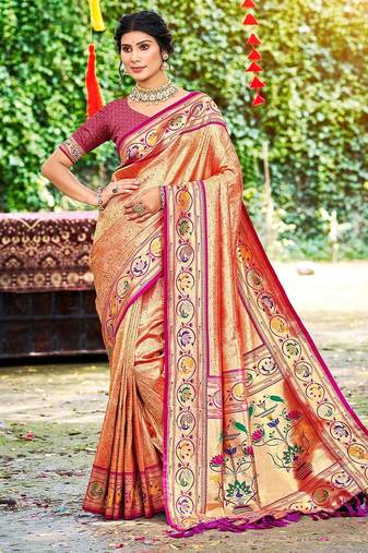 Orange color silk blended woven designer ethnic partywear saree