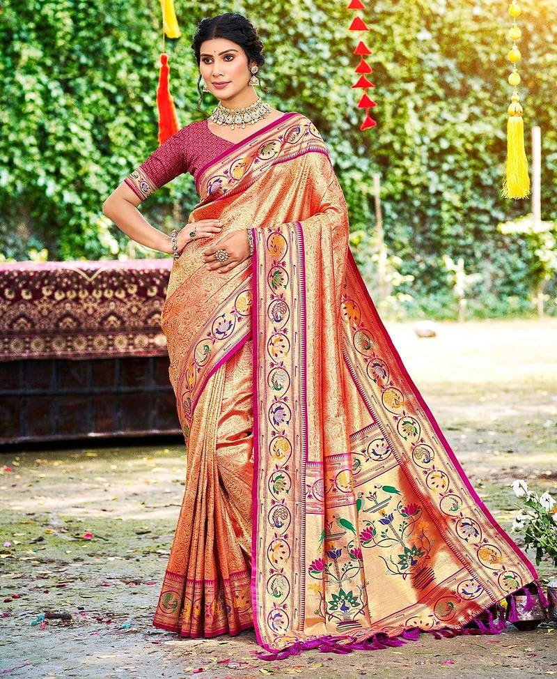 Orange color silk blended woven designer ethnic partywear saree