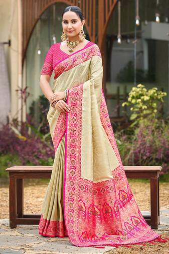 Beige color woven designer silk fabric ceremonial partywear saree