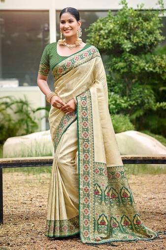 Beige color woven designer silk fabric ceremonial partywear saree