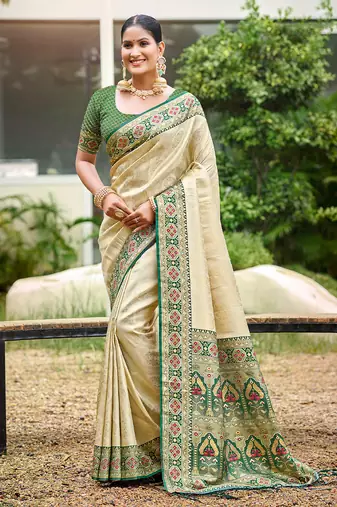 Beige color woven designer silk fabric ceremonial partywear saree