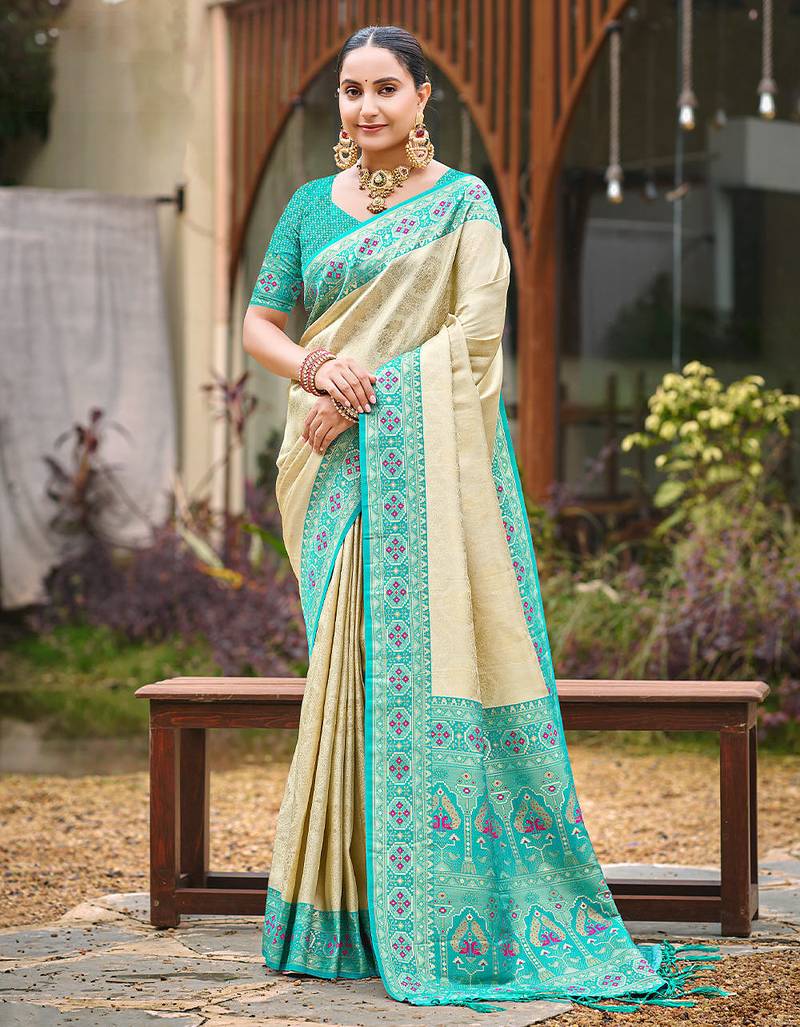 Beige color woven designer silk fabric ceremonial partywear saree