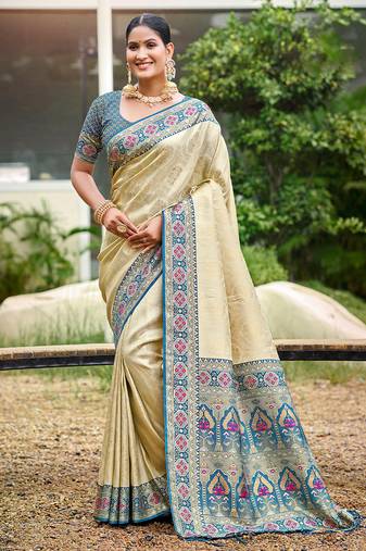 Beige color woven designer silk fabric ceremonial partywear saree