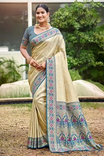 Beige color woven designer silk fabric ceremonial partywear saree