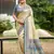 Beige color woven designer silk fabric ceremonial partywear saree
