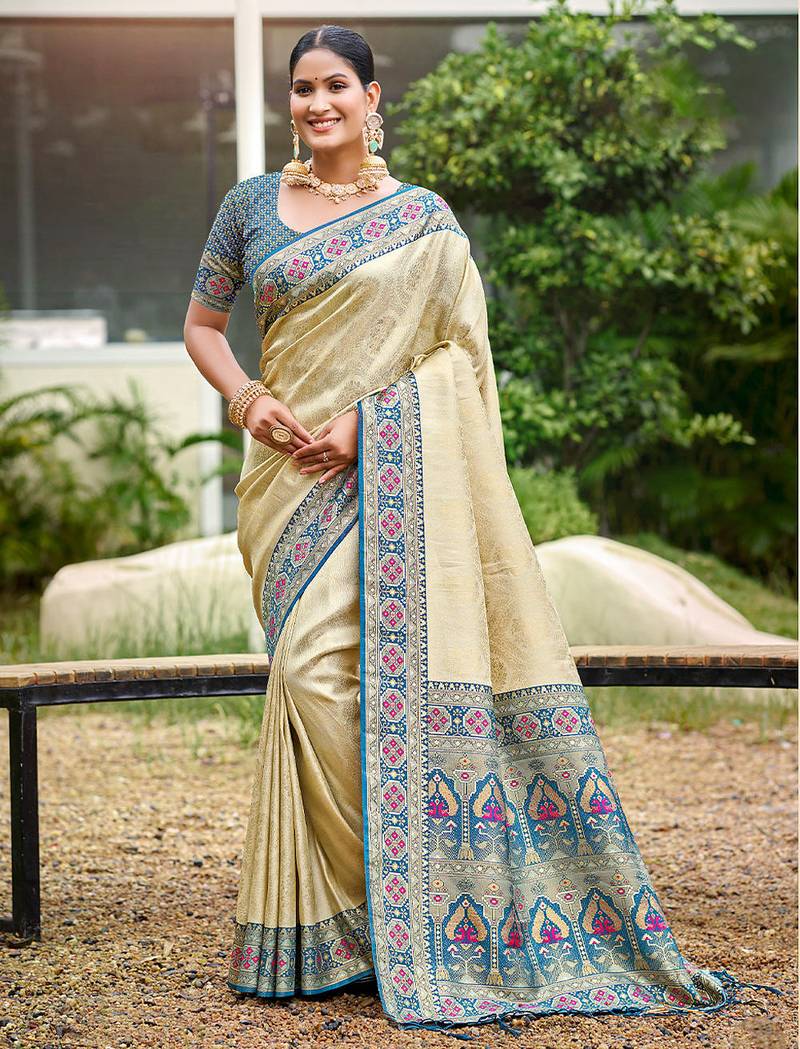 Beige color woven designer silk fabric ceremonial partywear saree