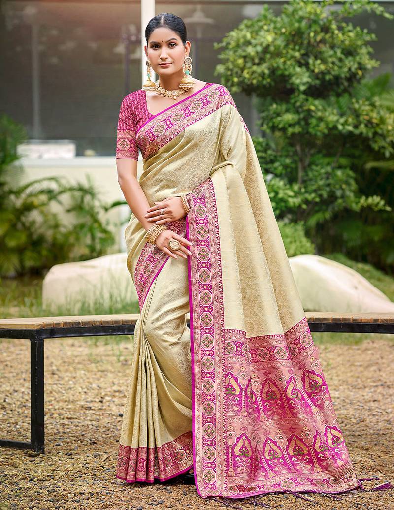 Beige color woven designer silk fabric ceremonial partywear saree